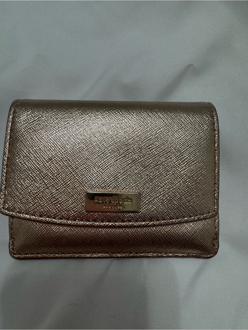 kate spade Metallic Rose Gold Saffiano Compact Wallet